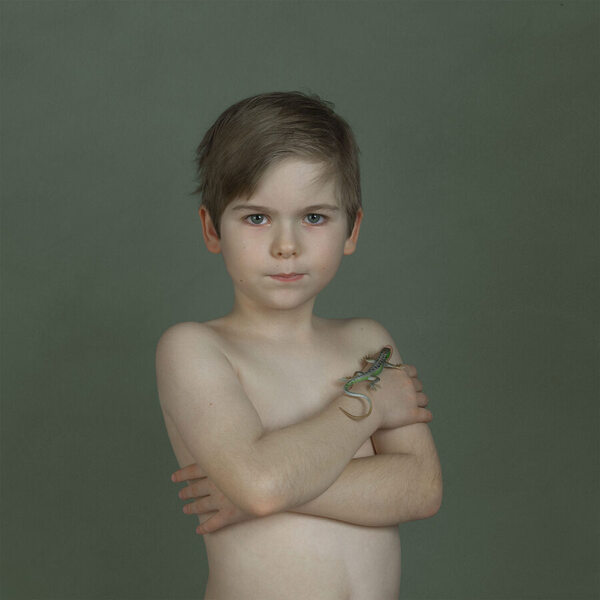 Photograph Natalie Vorontsoff Boy With Lizard on One Eyeland
